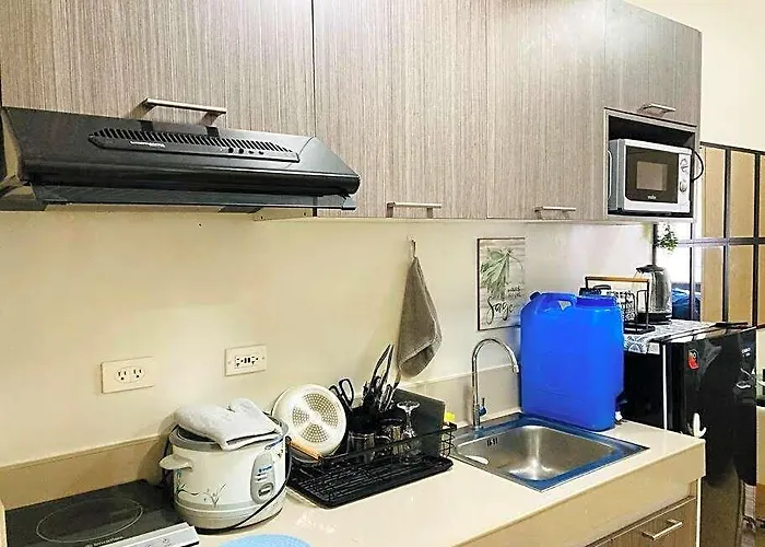 Отель Santorini Inspired 1bedroom Unit At Trees Residences